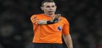 El exárbitro de la Premier League Coote fue acusado por la FA por comentarios ofensivos sobre Klopp.